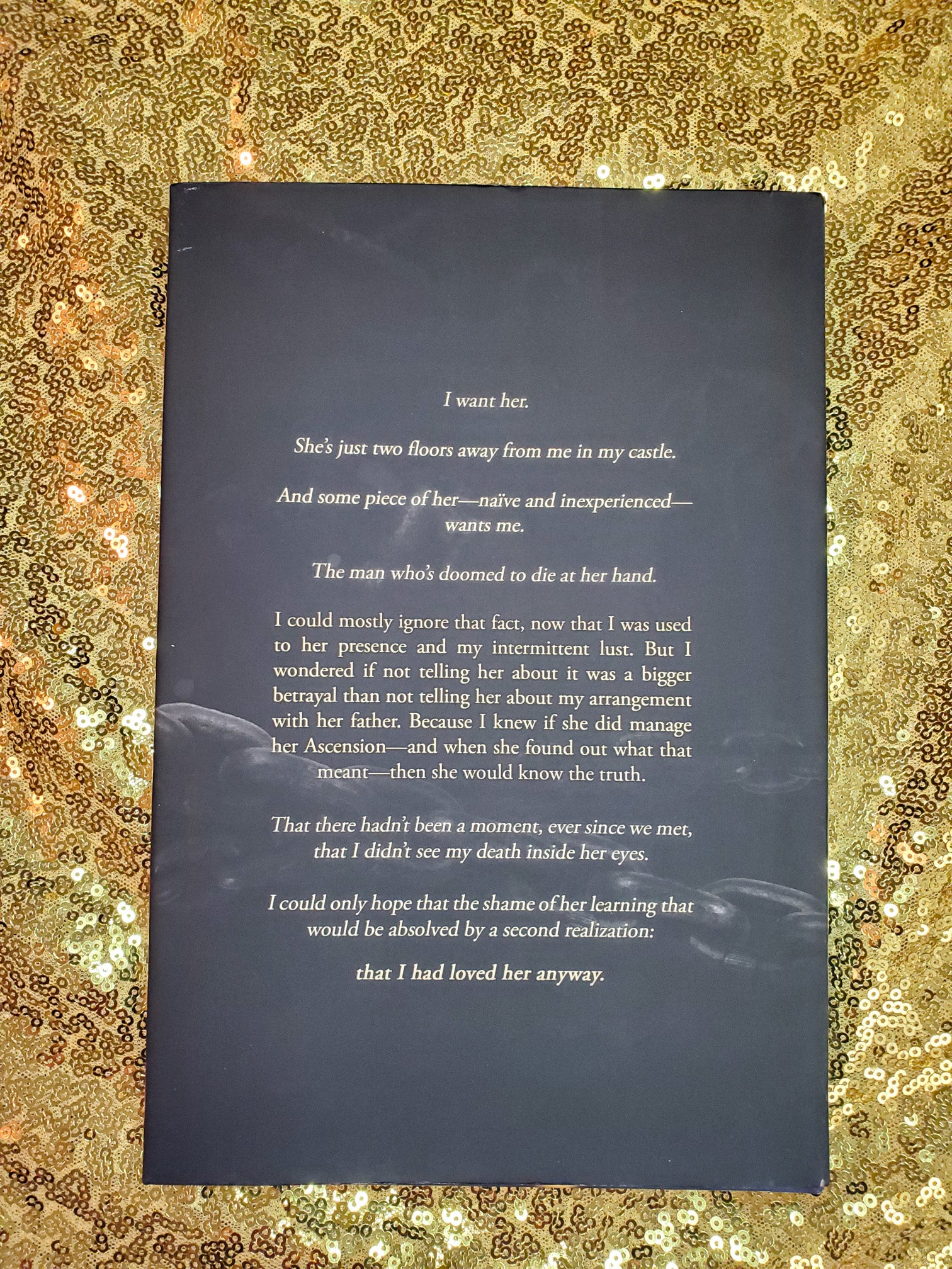 Hardcover of Break Her by Cassie Alexander on a gold sequined background. Image shows the back cover.