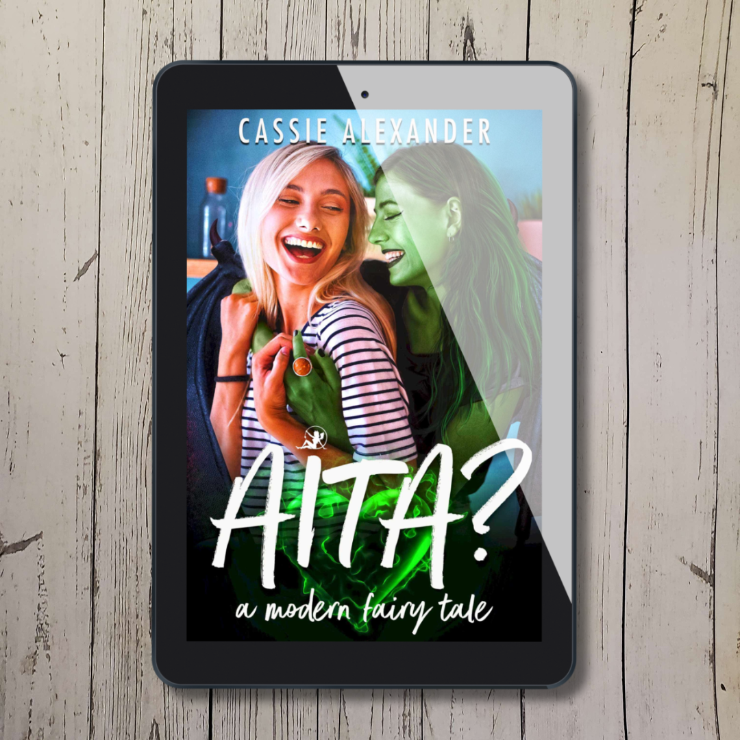 Tablet showing cover of "AITA?" by Cassie Alexander with two lesbians embracing and laughing; one is a blonde woman, the other is a green winged demon.