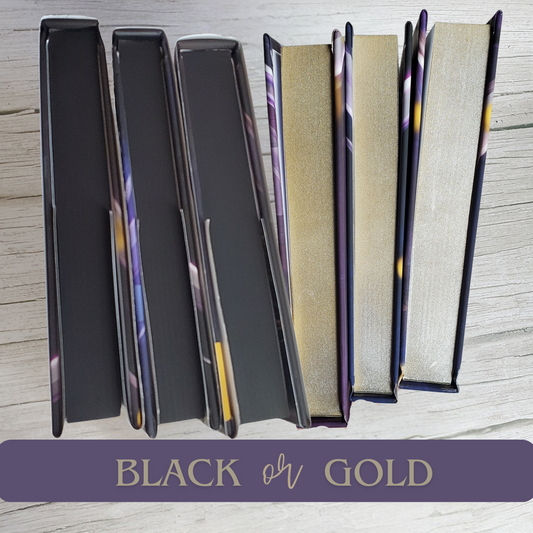 Hardback books of Bend Her, Break Her, and Make Her by Cassie Alexander. Showing gold sprayed edge set and black sprayed edge set.